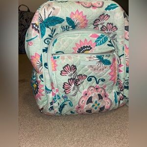 Vera Bradley Mint green Backpack with pink flower designs and other.